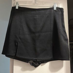 Black mini skort with two thigh slits